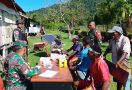 TNI Berikan Pelayanan Kesehatan Gratis Bagi Warga Perbatasan Papua - JPNN.com