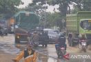 Luapan Sungai Kaliombo Menggenangi Jalur Pantura Pati - JPNN.com