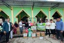 Santri Dukung Ganjar Serahkan Bantuan Untuk Korban Banjir di Makassar - JPNN.com