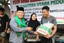 TGS Ganjar Sumut Salurkan Bantuan untuk Korban Banjir Sembahe Deli Serdang - JPNN.com