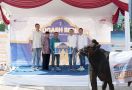 Maucash Berbagi, Potong Sapi Kurban 550 Kg Buat Masyarakat - JPNN.com