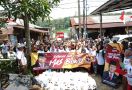 Relawan Mas Bowo Gelar Jalan Sehat dan Bagikan Bantuan di Sumsel - JPNN.com