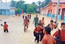 Banjir Melanda Rohul, Siswa Terpaksa Dipulangkan dari Sekolah - JPNN.com