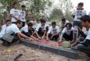 Crivisaya Ganjar Bersama Anak Muda Ogan Ilir Berziarah dan Tabur Bunga di Makam Pahlawan - JPNN.com