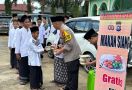 Kapolres Inhu Menukar Ratusan Paket Makanan dengan Doa Agar Pemilu Berjalan Damai - JPNN.com
