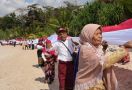 Pupuk Indonesia Bersama Relawan Bakti BUMN Bentangkan Bendera Merah Putih Sepanjang 1 KM - JPNN.com