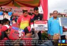 Tim Dayung Perahu Naga Koarmabar Raih Juara Satu - JPNN.com