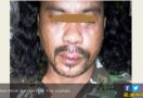 Pasang Muka Seram, Pria Berjaket Loreng Serang Polisi - JPNN.com