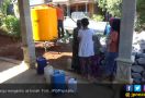 Kapolres Turun Tangan Bagi Air Bersih ke Perkampungan - JPNN.com