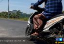 Beginilah Akibat Membonceng Anak di Bagian Depan Motor - JPNN.com