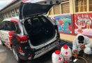 Mitsubishi Outlander PHEV Bantu Penyemprotan Disinfektan di Jakarta - JPNN.com