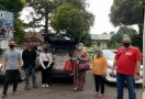 Relawan Jokowi Bagikan Ribuan Beras - JPNN.com