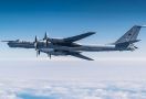 Pesawat Pengintai Rusia Gagal Menembus Pertahanan Udara Amerika, Langsung Dicegat F-22 - JPNN.com