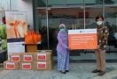 Hanwha Life Serahkan Donasi untuk Ringankan Warga saat Pandemi Covid-19 - JPNN.com