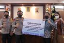 PT PP Salurkan Bantuan 26 Ribu Masker Medis untuk Polda Sulut - JPNN.com
