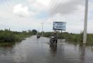 Aceh Utara Diterjang Banjir, Jalan Lintas Kecamatan Ini Sulit Diterobos - JPNN.com