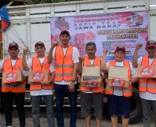 KST Dukung Ganjar Beri Bantuan Rompi dan Sepatu untuk Sopir Truk di Garut - JPNN.com