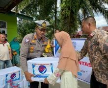 Rayakan HUT Lantas, Polres Rohul Berbagi Bansos Sekaligus Sosialisai Pilkda Damai - JPNN.com