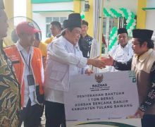 Korban Banjir Rob di Tulang Bawang Terima Bantuan 1 Ton Beras - JPNN.com