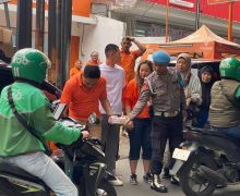 Tangkas Berbagi Ribuan Nasi Kotak Gratis di Depok - JPNN.com