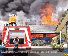 Pembakaran 7 Gedung SD, Yansen Binti Serahkan Uang di Garasi - JPNN.com