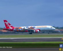 Bagasi Milik Penumpang Terlambat Datang, AirAsia Beri Penjelasan Begini - JPNN.com