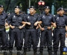 Tak Main-Main, Pemerintah Malaysia Kerahkan 55 Ribu Polisi Awasi Warga selama 14 Hari - JPNN.com