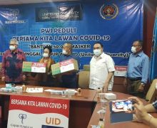 Gajah Tunggal Group Menyerahkan Bantuan 50 Ribu Masker ke PWI - JPNN.com