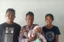 Aksi Heroik Brigpol Alfred Selamatkan Bayi 9 Bulan Tercebur ke Laut - JPNN.com