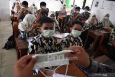 Benarkah Masker Kain Tidak Aman Tangkal Penularan Virus Corona? - JPNN.com