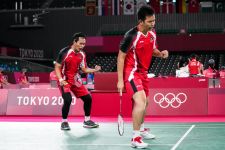 Gagal Bawa Pulang Medali Tokyo 2020, Ahsan/Hendra Menolak Pensiun - JPNN.com