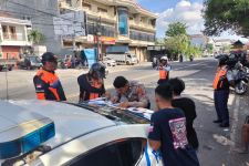 Polresta Denpasar Sikat Parkir Liar di Jalan Kargo, Tiga Truk Bandel Jadi Sasaran - JPNN.com Bali