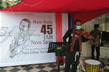 Main Musik Biola 45 Jam Nonstop, Arul Harap 10 November Jadi Libur Nasional - JPNN.com Jatim