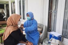 Polsek Bojongsari Buka Gerai Vaksin di Lokasi Wisata, Ada Hadiah Menarik Loh - JPNN.com Jabar