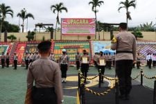 AKBP Satya Widhy Widharyadi Memimpin Upacara PTDH 2 Personel Polres Tanggamus - JPNN.com Lampung