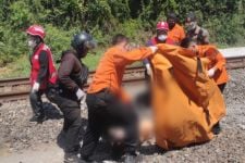 Perempuan Paruh Baya Asal Manukan Tewas Tertabrak Kereta Api - JPNN.com Jatim
