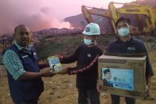 JQR Bangun Tenda Medis dan Bagikan 1.000 Masker ke Warga Terdampak Kebakaran TPA Sarimukti - JPNN.com Jabar