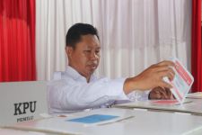 Gunakan Hak Pilihnya, Pj Bupati Bogor Lakukan Pencoblosan di TPS 02 Kelurahan Tengah - JPNN.com Jabar