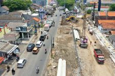 Proyek Pelebaran Jalan di Wiyung-Babatan Ditargetkan Rampung Desember 2024 - JPNN.com Jatim