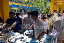 Ribuan Porsi Makan Bergizi Gratis Dibagikan ke Sekolah Muhammadiyah 2 Sidoarjo - JPNN.com Jatim