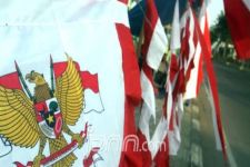 Qodratul Ikhwan Sampaikan Makna Memasang Bendera Merah Putih Memperingati HUT RI - JPNN.com Lampung