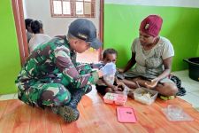 Satgas Pamtas Yonif Raider 142/KJ Berpartisipasi Dalam Pelayanan Gizi 1000 HPK - JPNN.com Papua