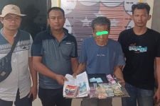 Kakek Penulis Togel di Sumut Ini Ditangkap, Polisi Sita Uang dan Buku Tafsir Mimpi - JPNN.com Sumut