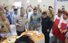 Ciptakan Pilkada Damai, Polisi Satukan Paslon Bupati Rohul Dalam Lomba Memasak - JPNN.com