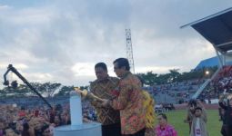 Menkumham Nyalakan Obor Paskah di Minahasa - JPNN.com