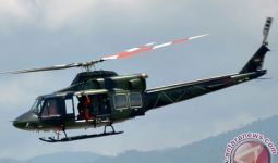 Jenazah Nakes Korban Kekerasan KKB Dievakuasi dengan Helikopter Penerbad - JPNN.com