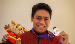 Cerita Izam, Menjalani 2 Profesi sebagai Pengawai BRI dan Atlet Menembak Indonesia - JPNN.com