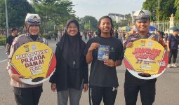 Cara Unik Satlantas Polresta Pekanbaru Sosialisasi Pilkada Damai di CFD - JPNN.com