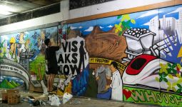 Mural Buatan Anak Muda Ikut Sambut Kepulangan Jokowi di Solo - JPNN.com