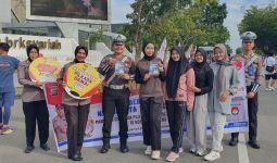 Satlantas Polresta Pekanbaru Amankan CFD Sekaligus Sosialisasi Pilkada Damai - JPNN.com